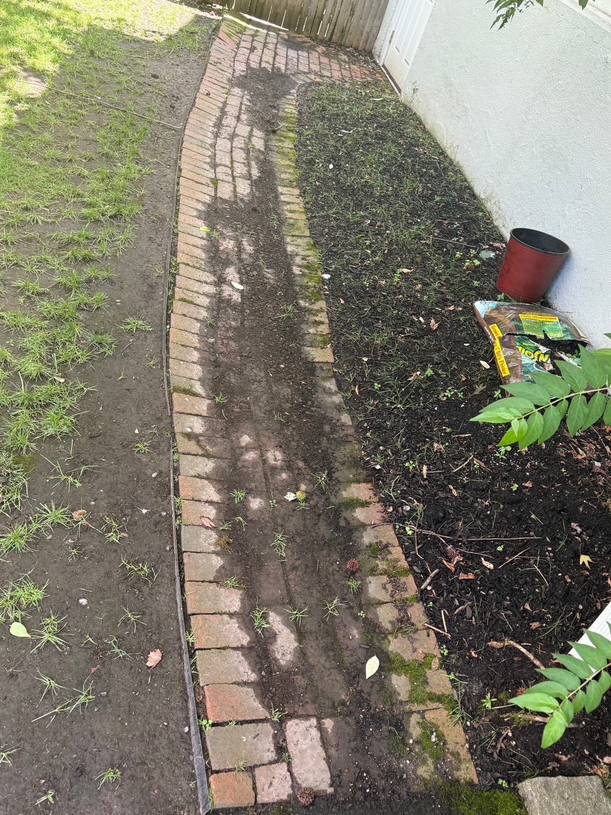 Dirty brick walkway before pressure washing in Millburn NJ